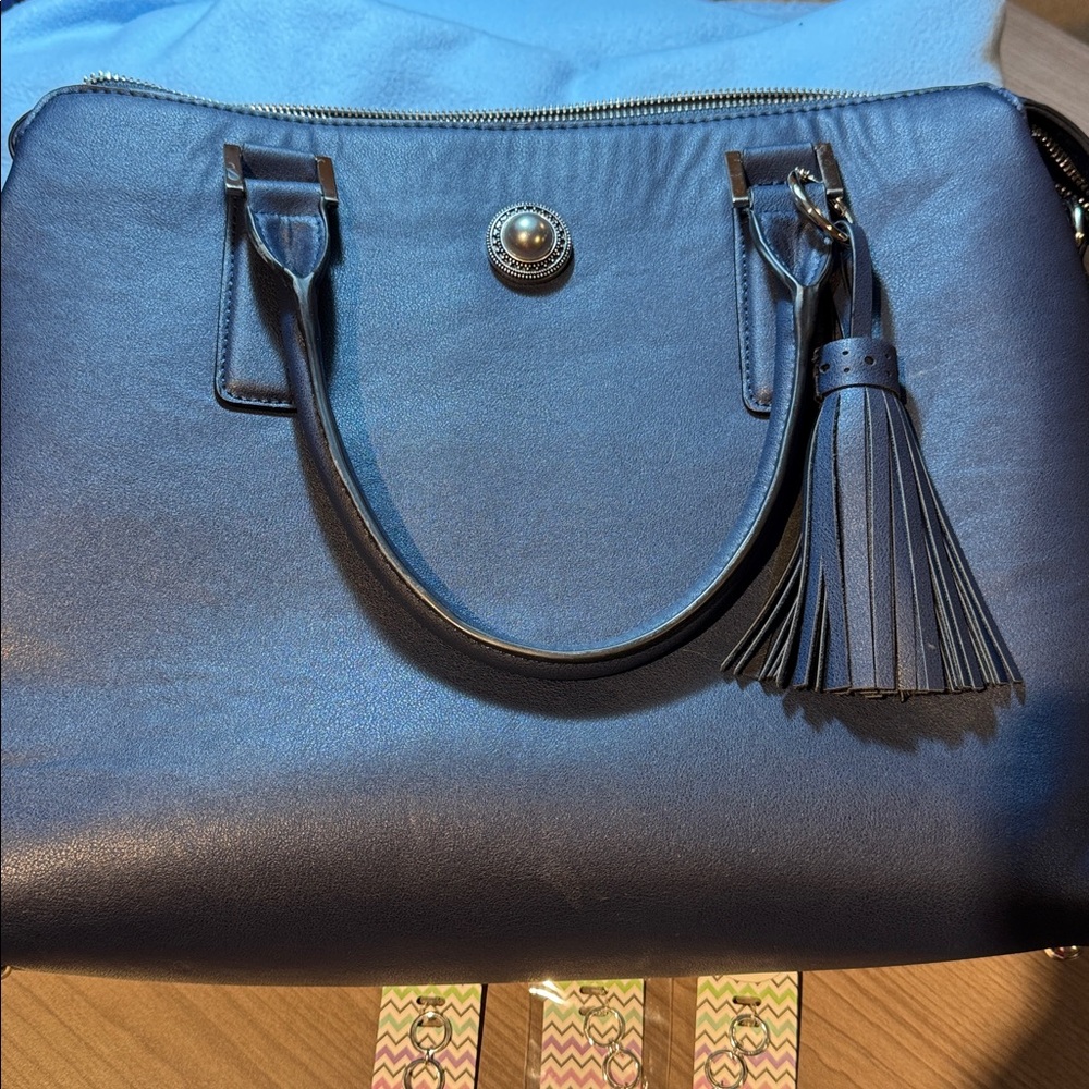 Elegant Black Handbag with Tassel